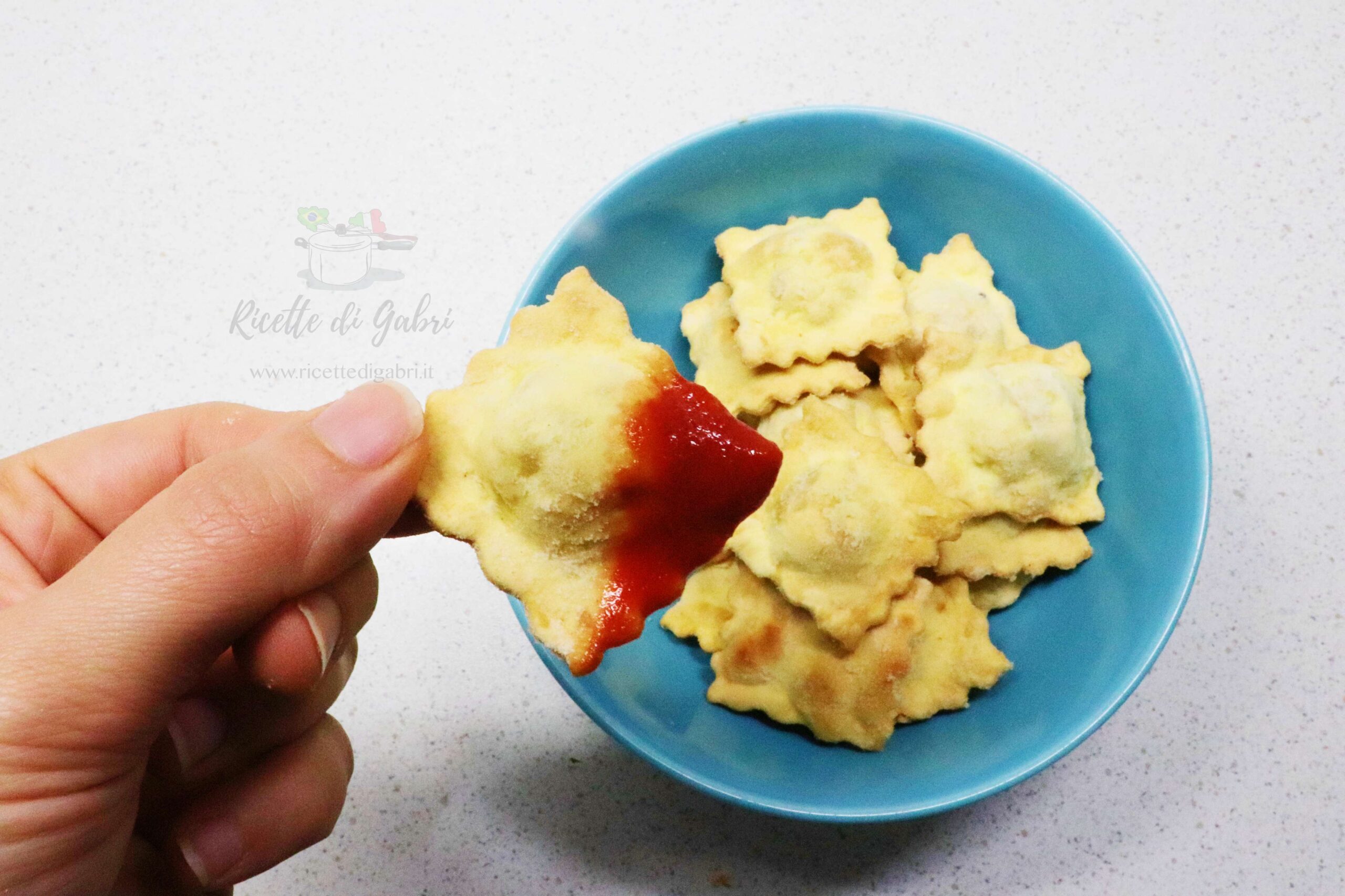 ricetta snack veloce ravioli pasta avanzata cotta al forno croccanti